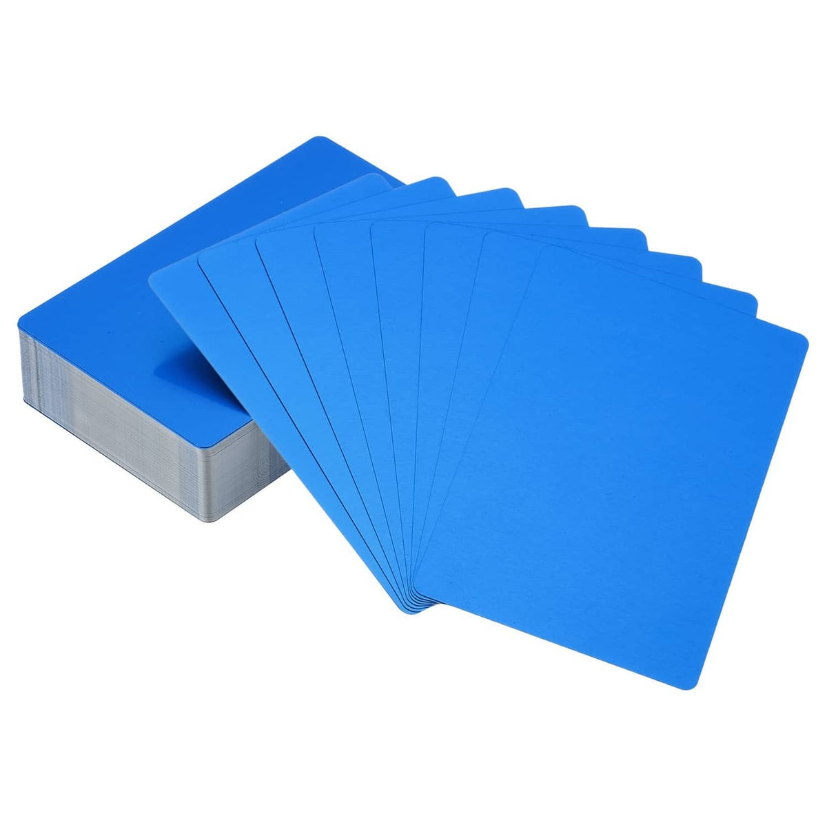 Set of blank blue metal business cards, stacked with silver edges.
