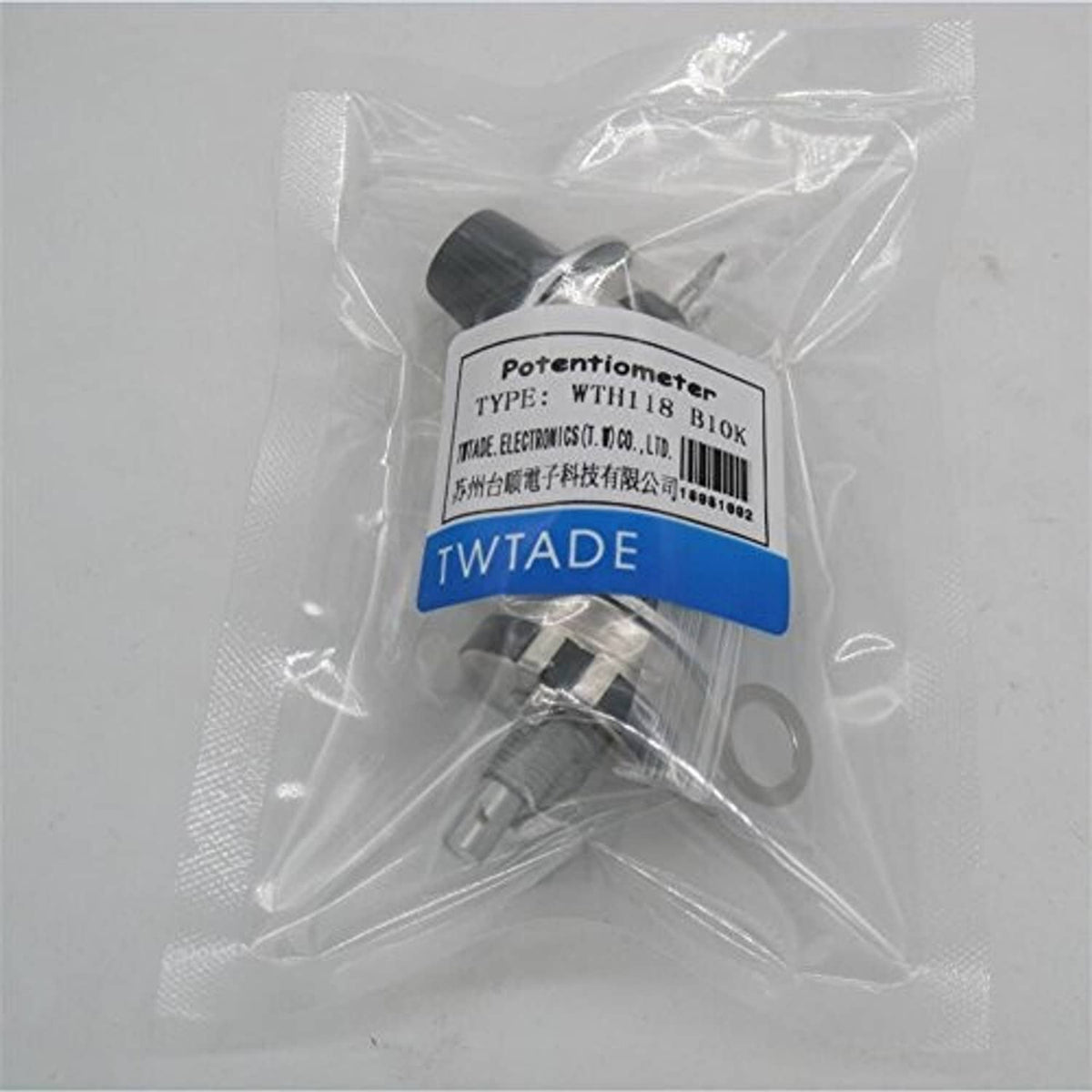 Bagged potentiometer labeled WT18 B10K, silver shaft, black knob, and mounting pins