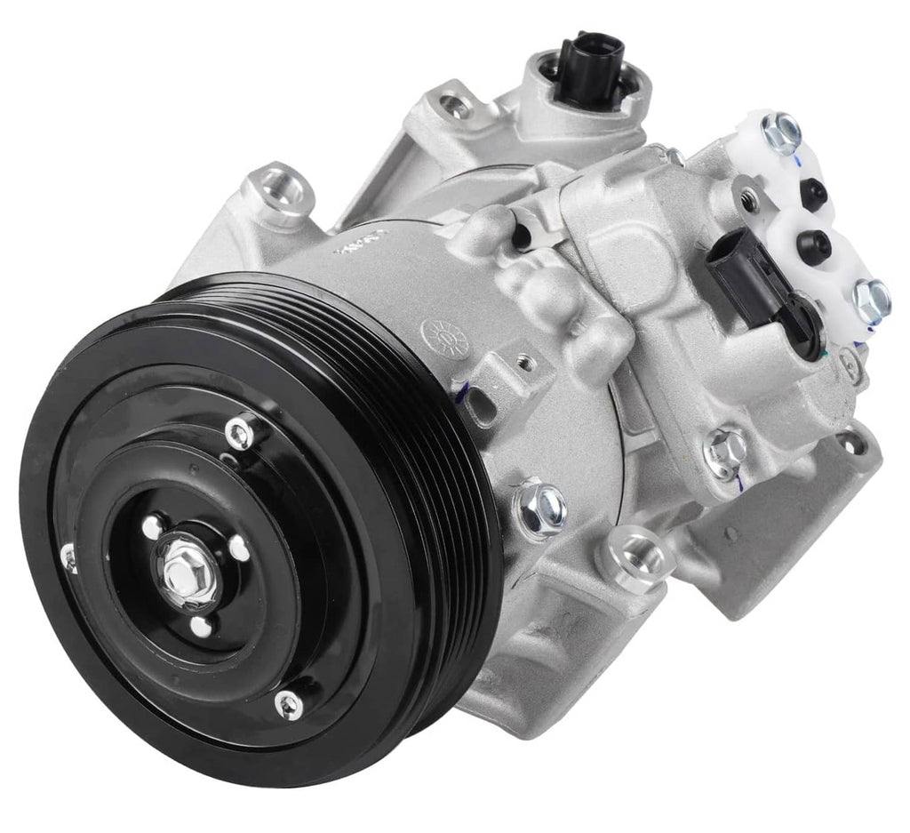 A/C air compressor with black pulley wheel and multiple electrical ports, angled view