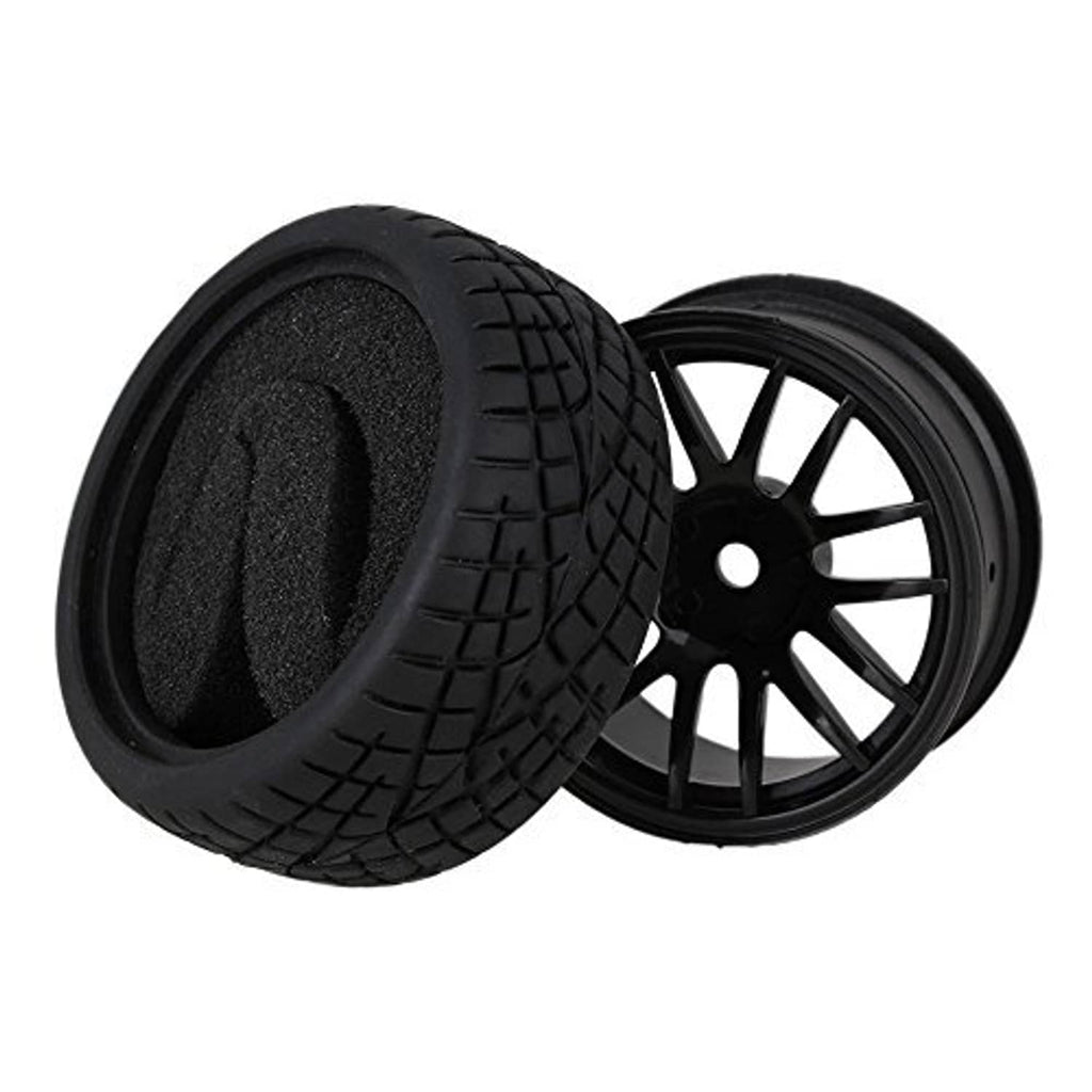 Black 14-spoke wheel rim with black tread tire, angled close-up