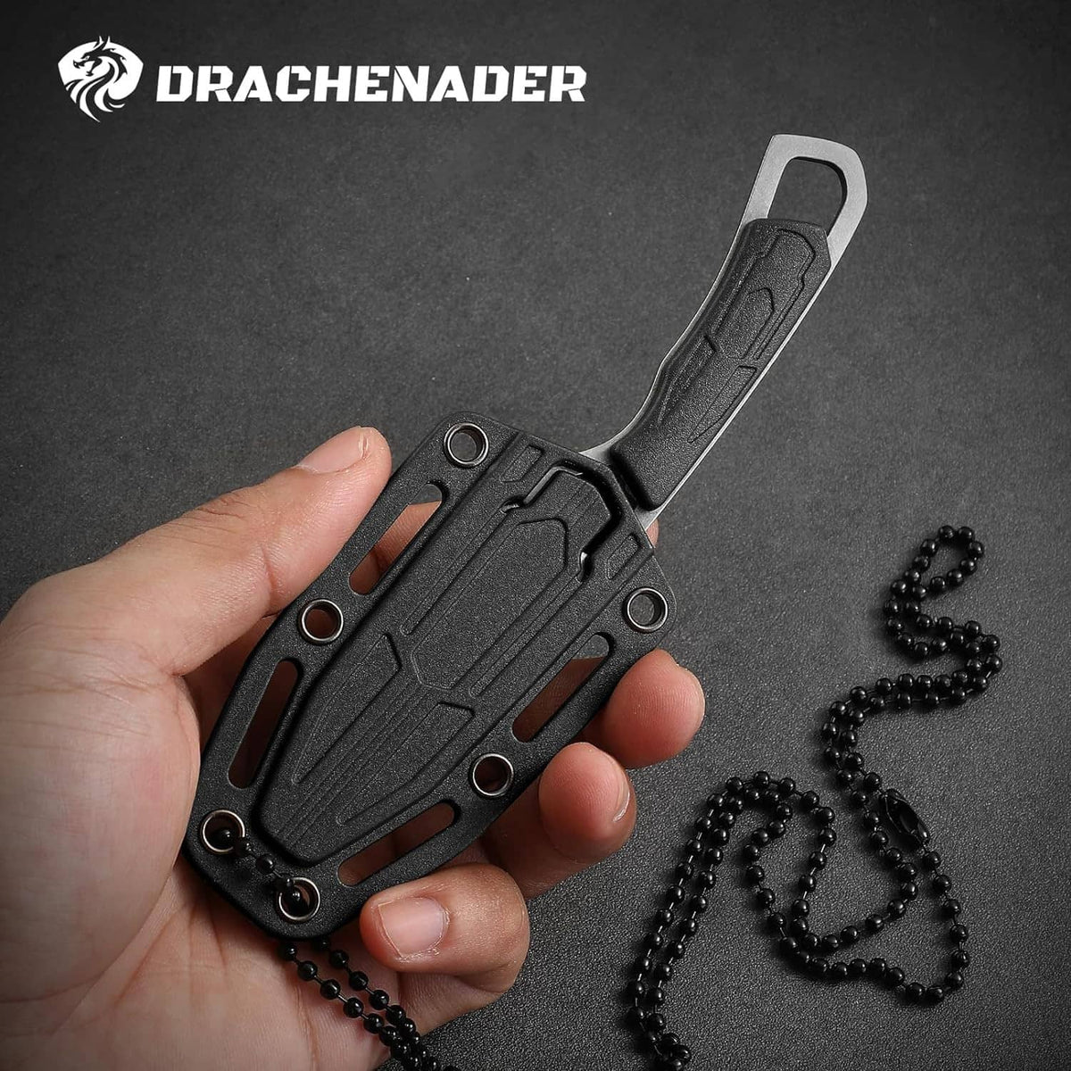 Small tanto neck knife with black sheath held above beads on chain