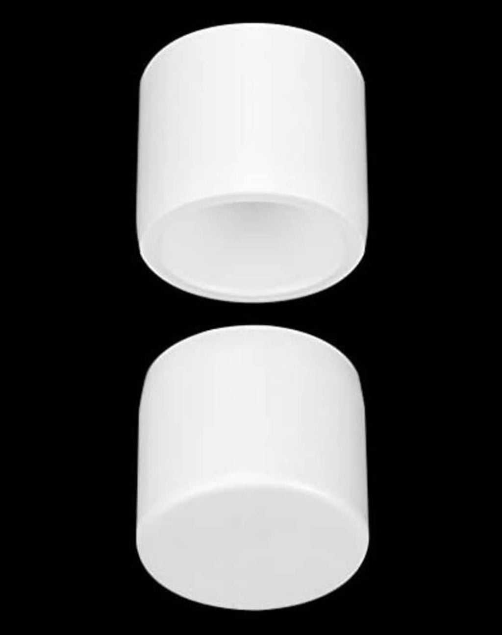 White PVC pipe end cap pair, smooth round exterior with hollow opening