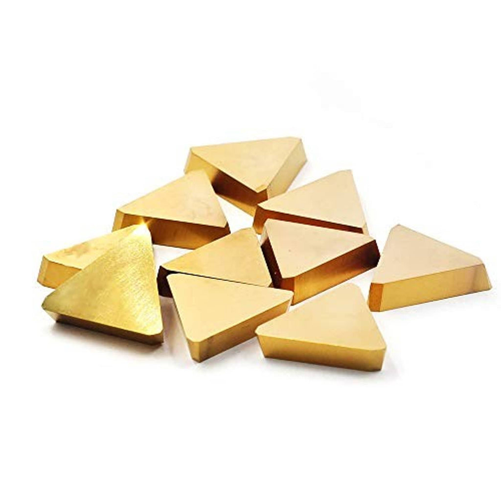 Triangular carbide turning inserts, gold coated faces, overlapping heap