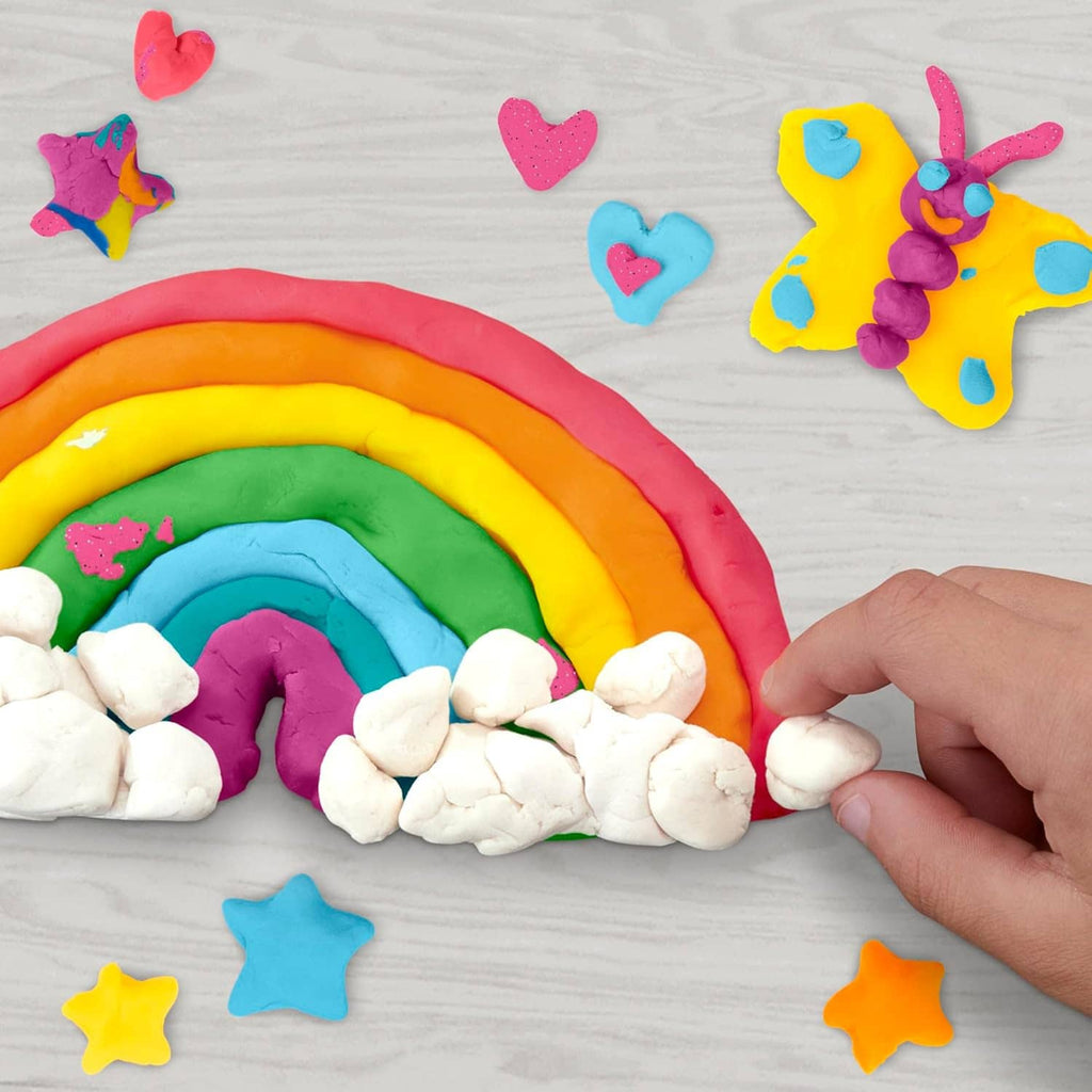 Rainbow Play-Doh clay with star and heart shapes and hands shaping