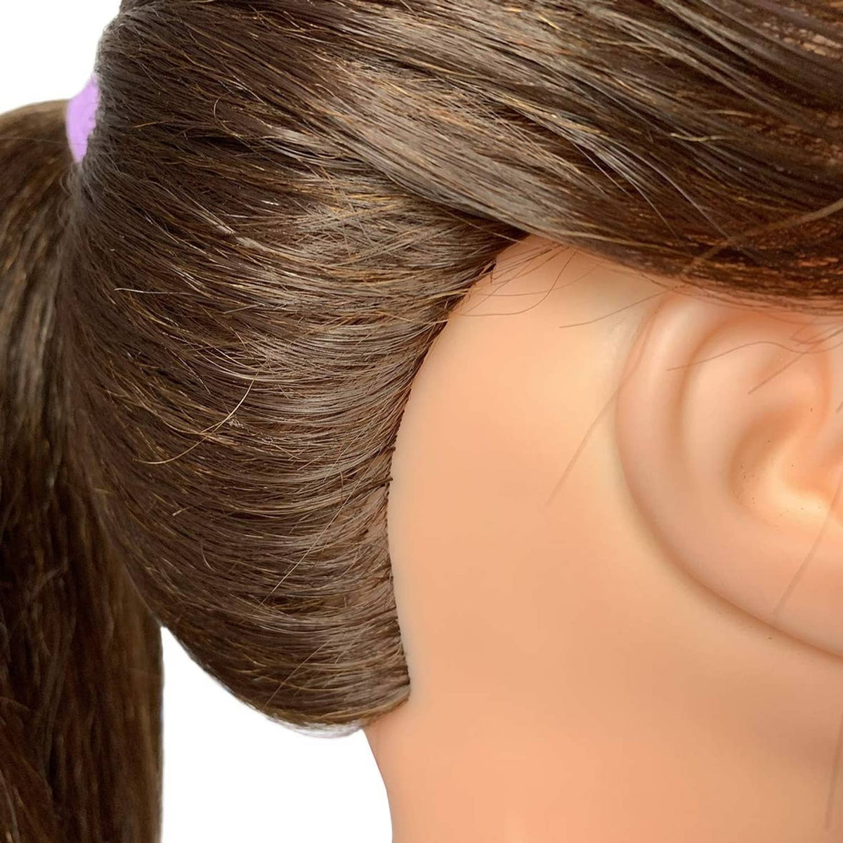 Brown human hair training practice head mannequin hair texture close-up