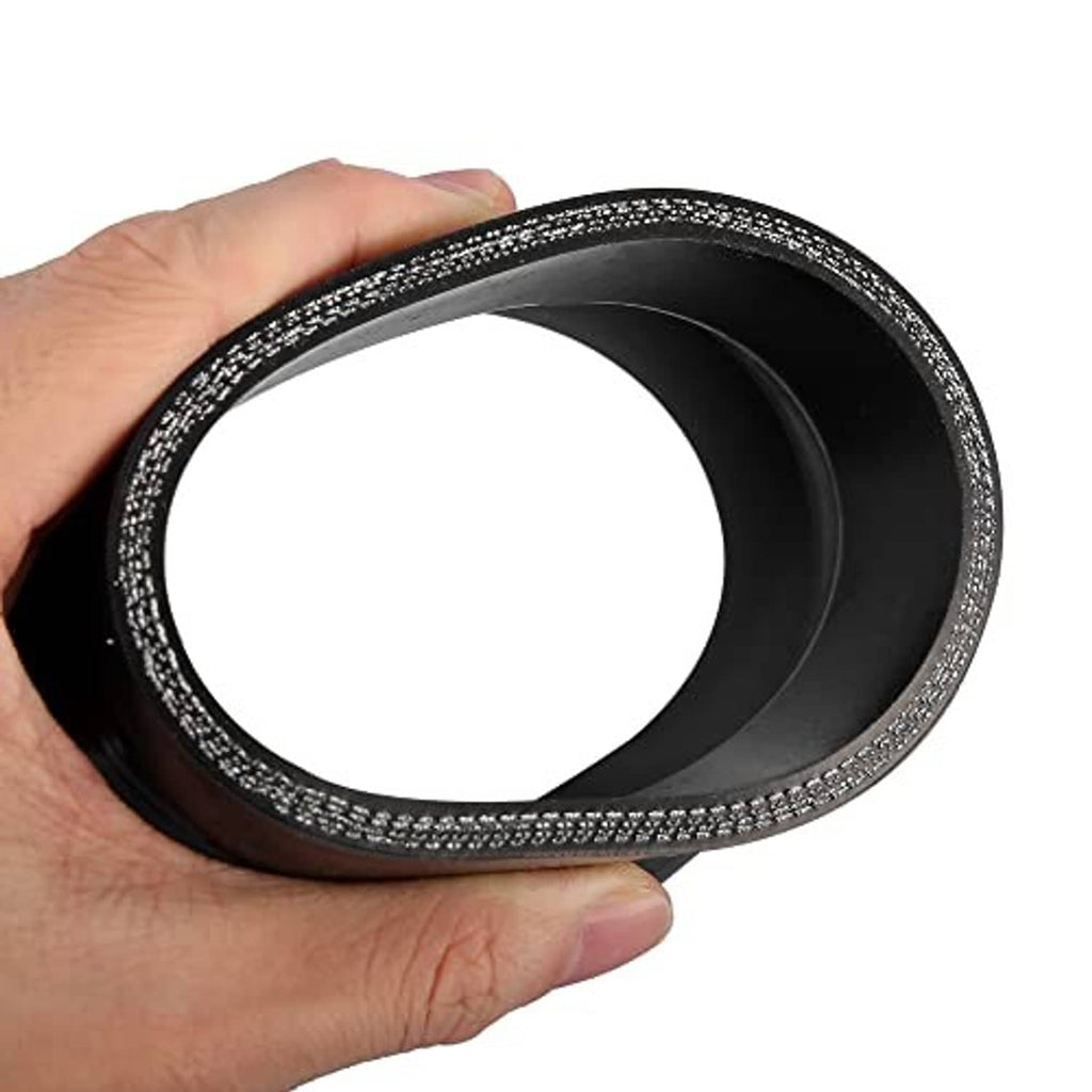 Black silicone reducer hose coupler held in hand, textured rim, smooth inner opening