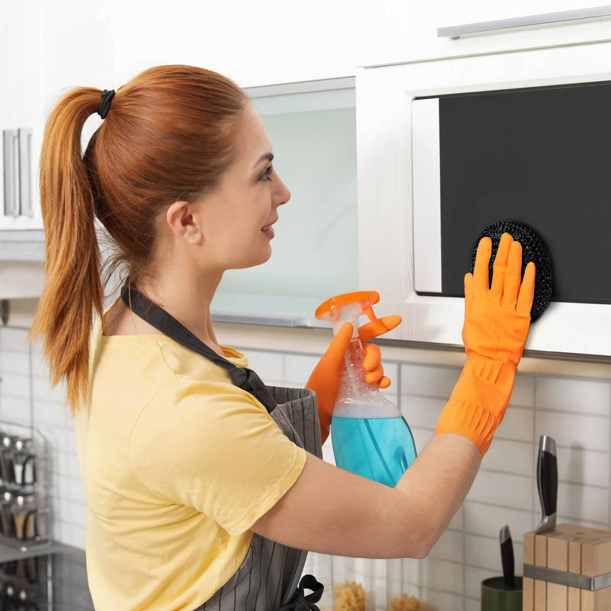Black round nylon dish scrubber pad for scrubbing kitchen surfaces