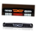 LED third brake light assembly with smoke lens and illuminated red X-bar center