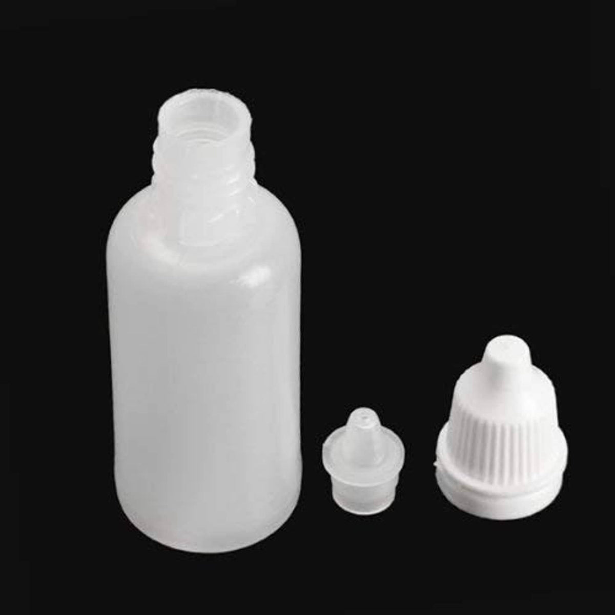 White empty plastic dropper bottle set with ribbed caps, including small nozzle