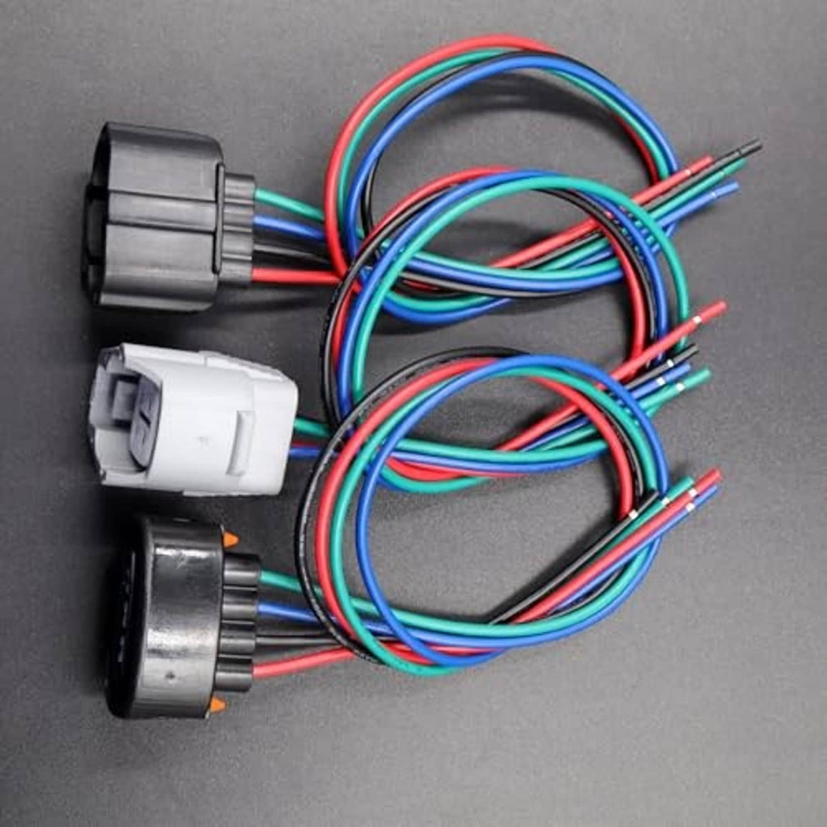 Throttle body connector harness with three plug ends and bundled multi-colored wire leads