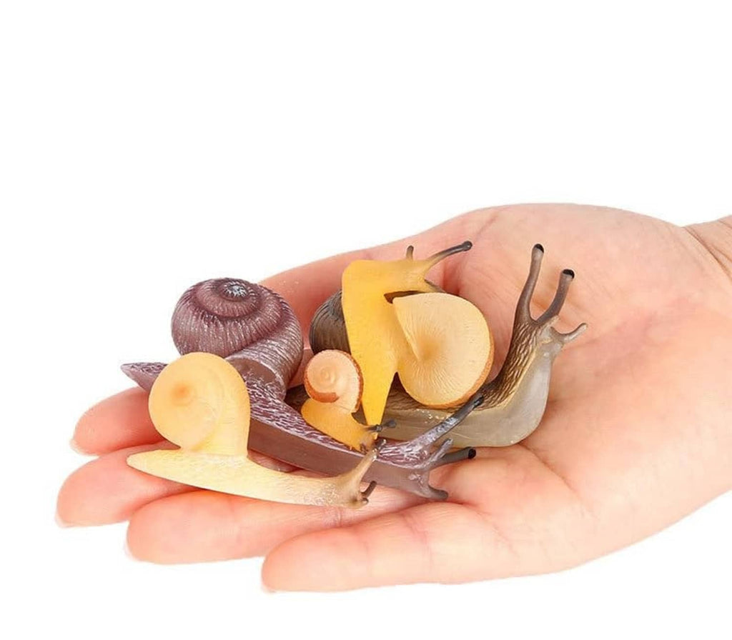 Realistic mini snail figurines nestled in an open hand, assorted shell colors and antennae.