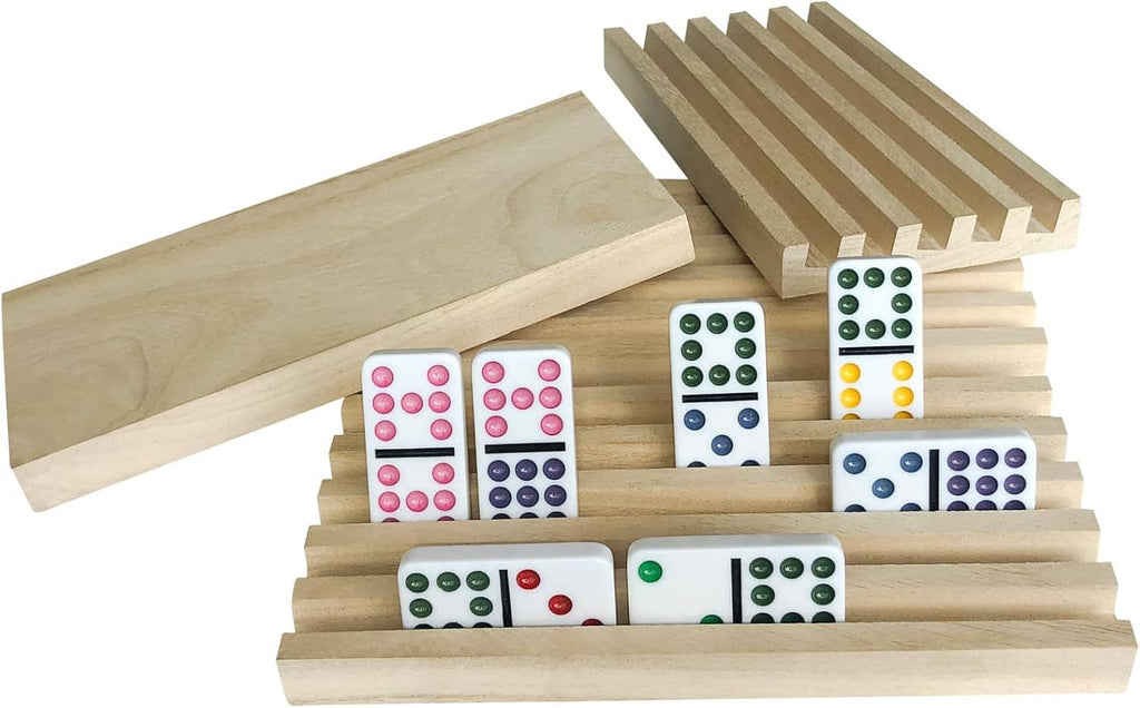 Wooden domino rack holders with slatted trays and white domino tiles showing colored dot faces