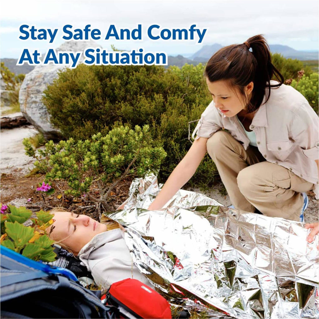 Silver foil mylar rescue blanket covering people, reflective heat insulation