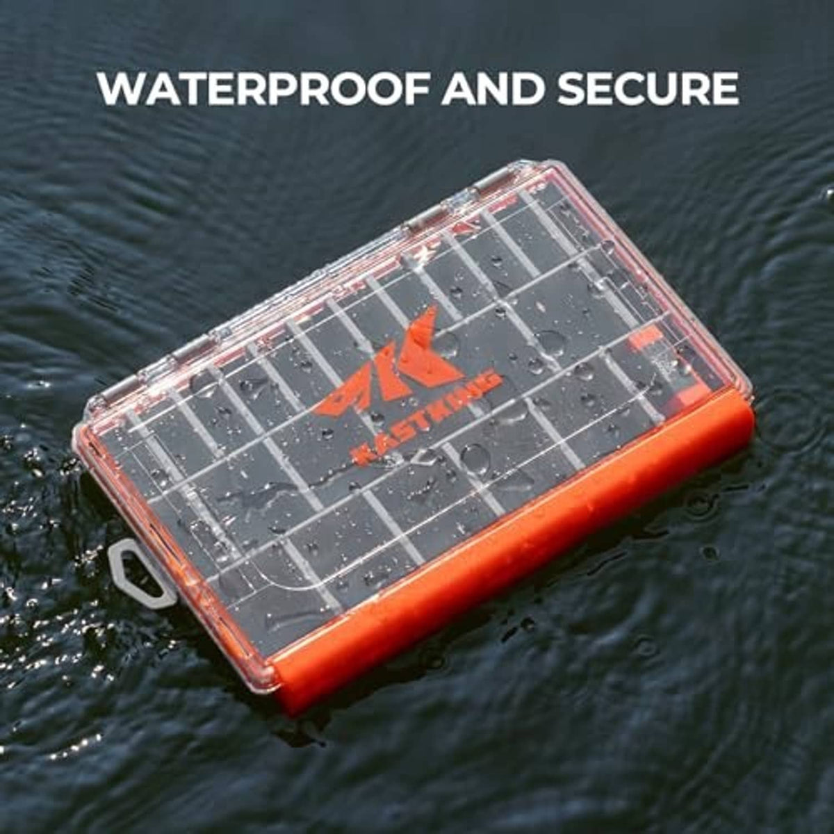 Orange waterproof tackle box floating in water with clear lid and gray grid compartments
