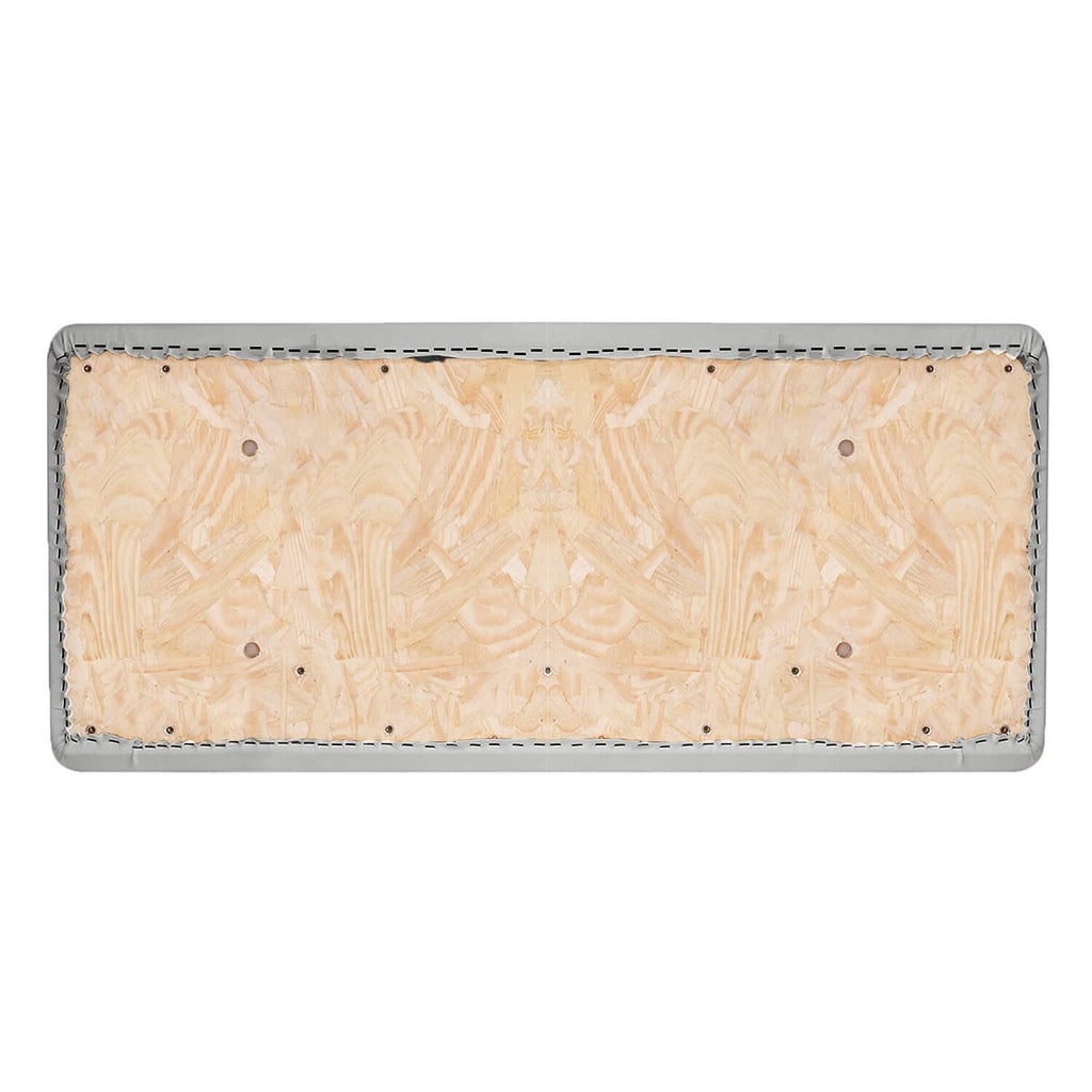 Underside of seat cushion with beige backing and metal grommets