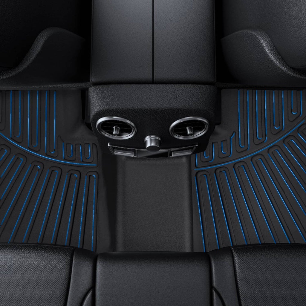 Black rubber cargo liner with raised side channels and central containment area