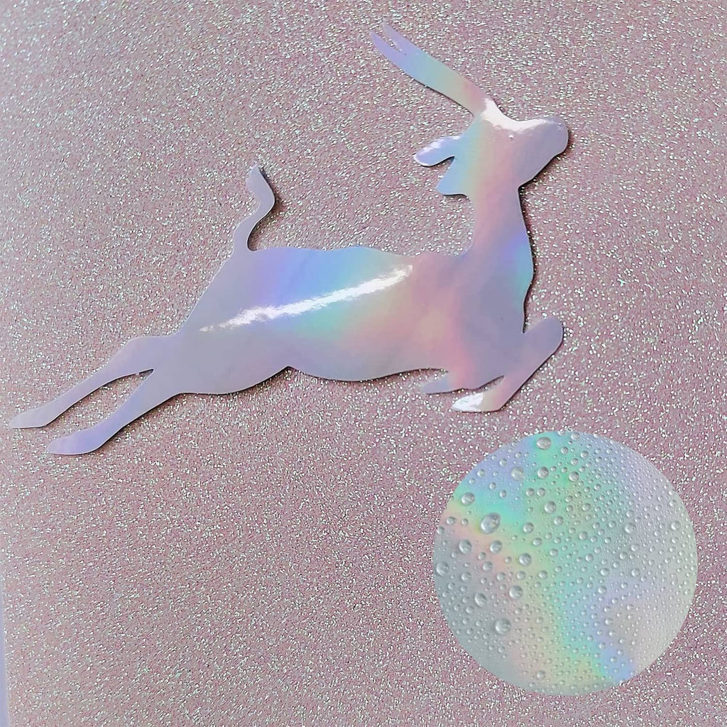 Holographic unicorn and moon stickers on glittery iridescent vinyl