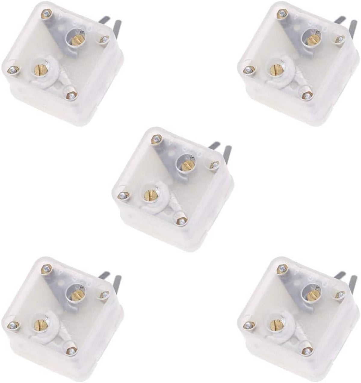 Five duplex radio variable capacitors showing white cases, gold screws, and pin terminals