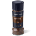 Davidoff Espresso 57 instant coffee jar with dark roast ground coffee in clear base