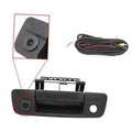 Black tailgate handle backup camera with round lens and mounting frame