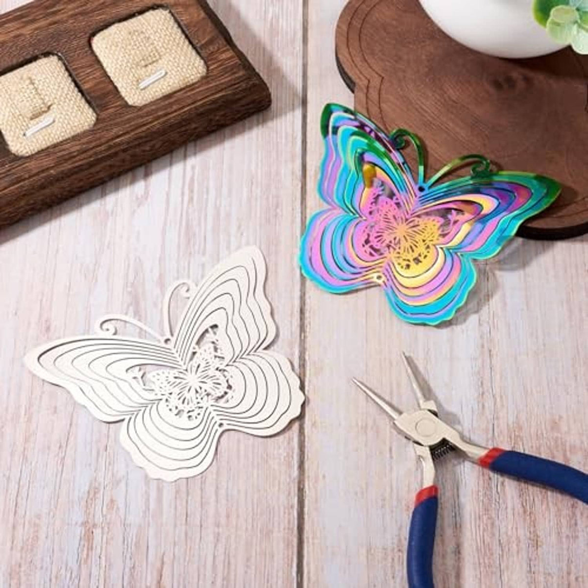 Butterfly filigree pendant pieces in colorful and white with small silver chain rings
