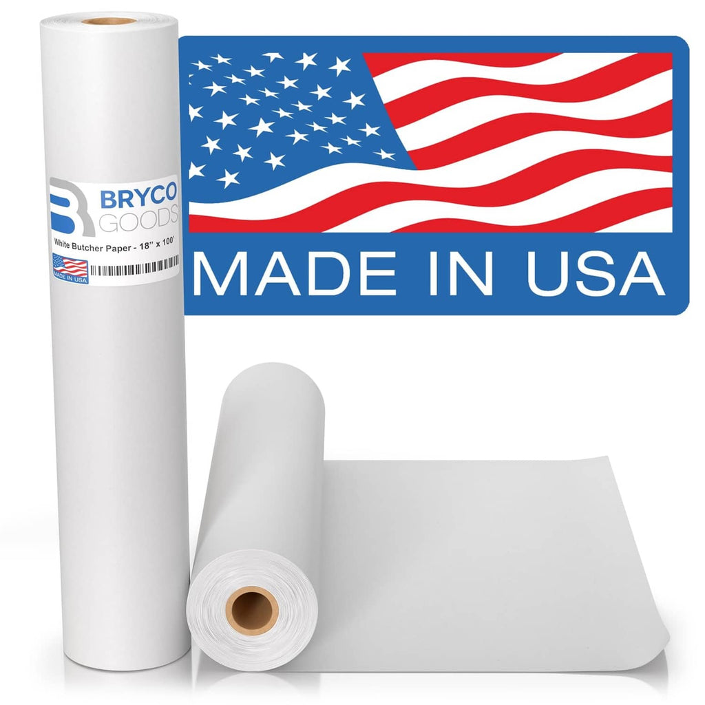 White kraft butcher paper roll with matching sheet pieces and visible cardboard core