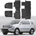 Black TPE front and rear floor mat liners set with raised channels and heel pads