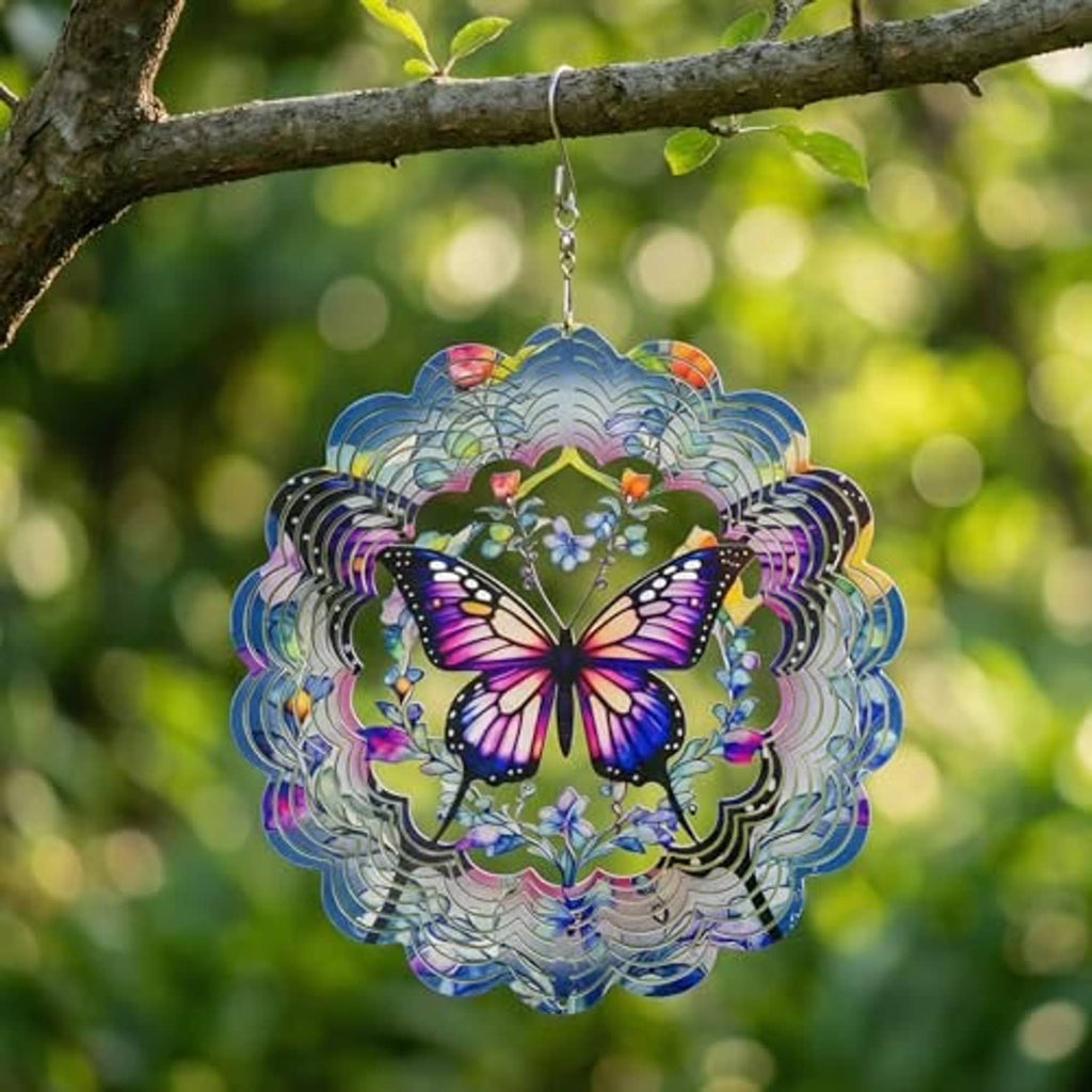 Metal butterfly wind spinner with blue and purple layered rings and a butterfly center, hanging.