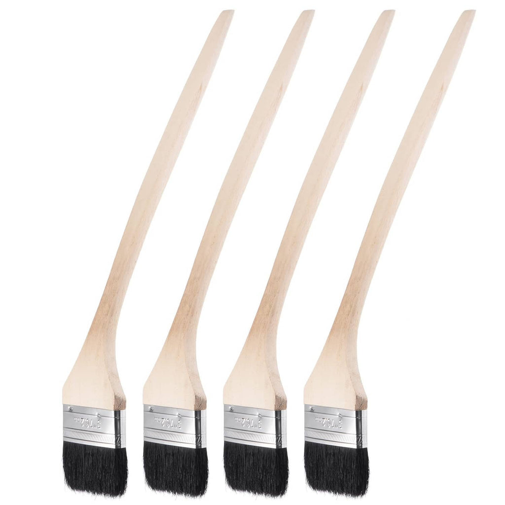 Set of bent radiator paint brushes with black bristles and light wood handles