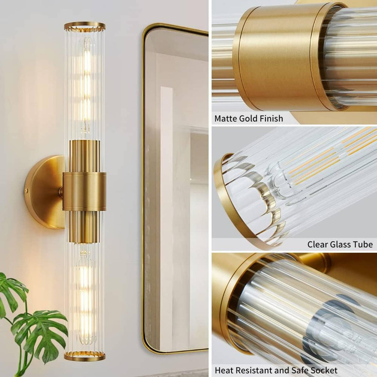 Matte gold vanity wall light with clear glass tube and round wall mount bracket.
