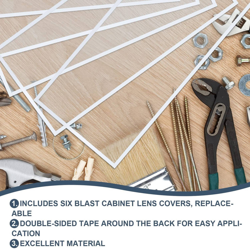 Six blast cabinet lens cover sheets with double-sided adhesive backing on a work surface