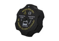 Black radiator cap with warning text and radiator 15 PSI markings