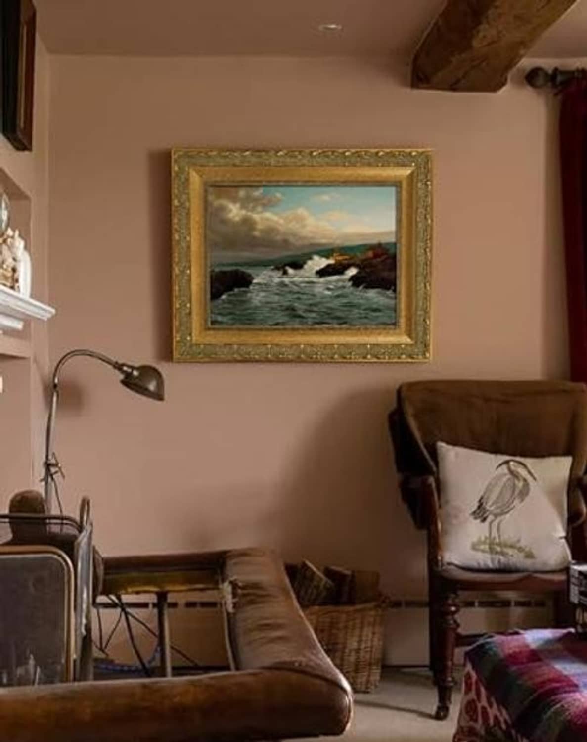 Gold ornate wall picture frame with carved trim, featuring a classical figure painting