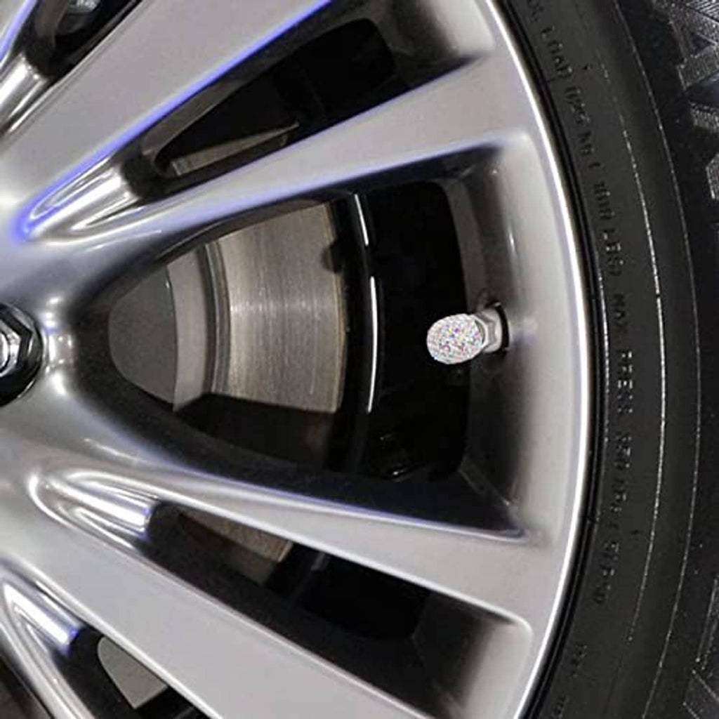 Multicolor AB rhinestone tire valve stem cap on silver wheel spoke