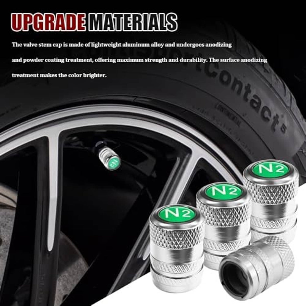 Silver tire valve stem caps with green N2 tops on a vehicle wheel rim (4-pack)