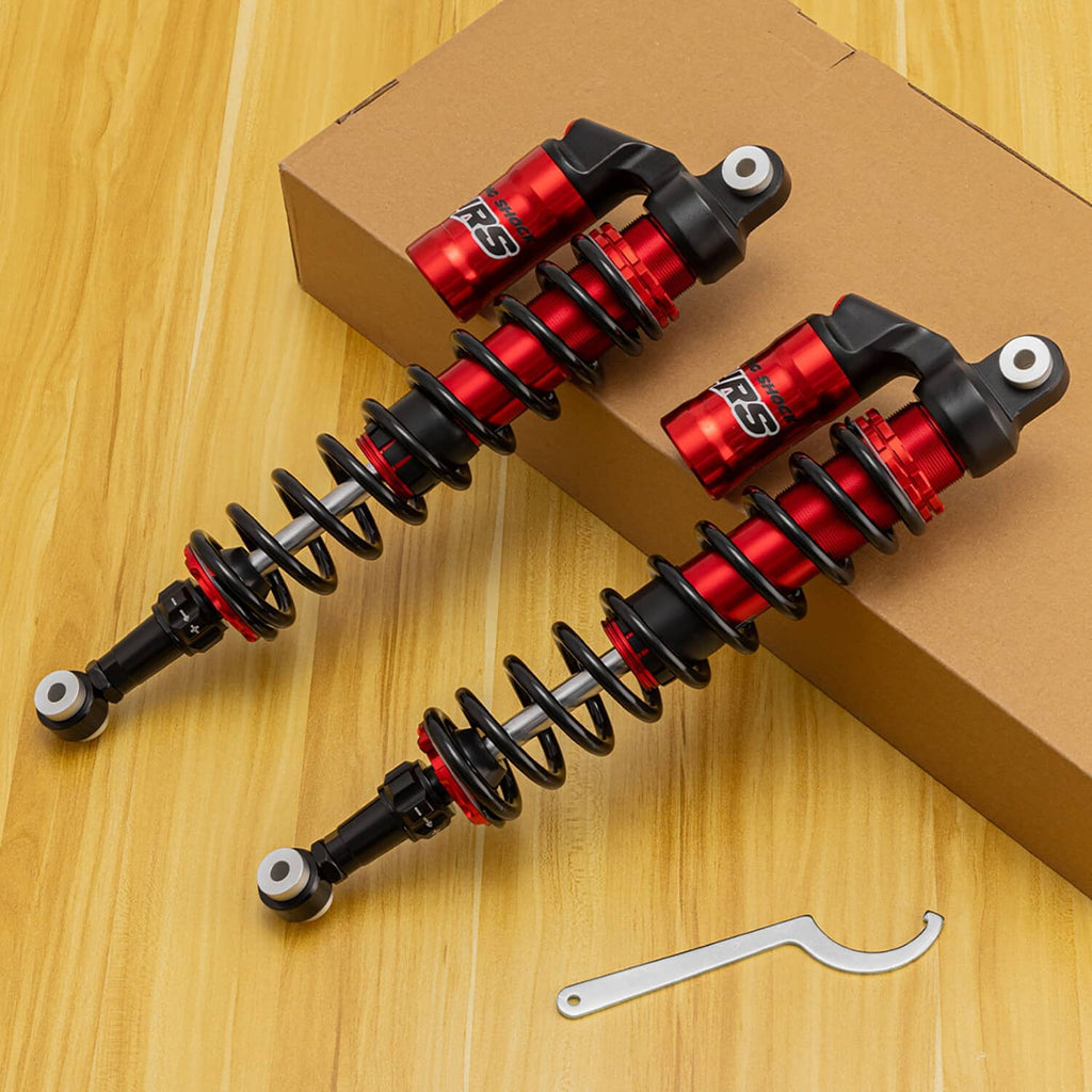 Two rear air shock absorbers with red reservoirs and black coil springs, side mounts
