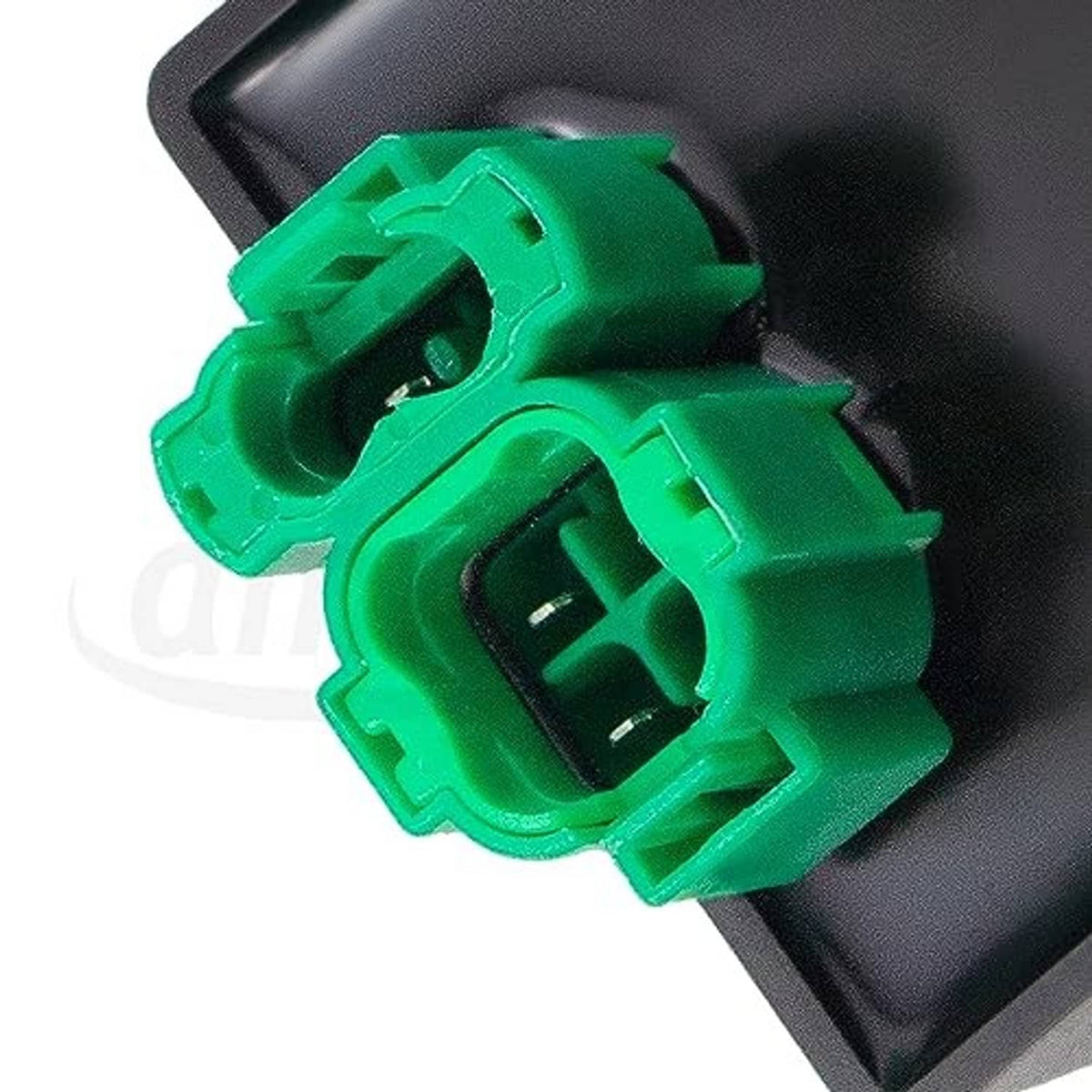 CDI ignition module connector ends on green plugs atop black module