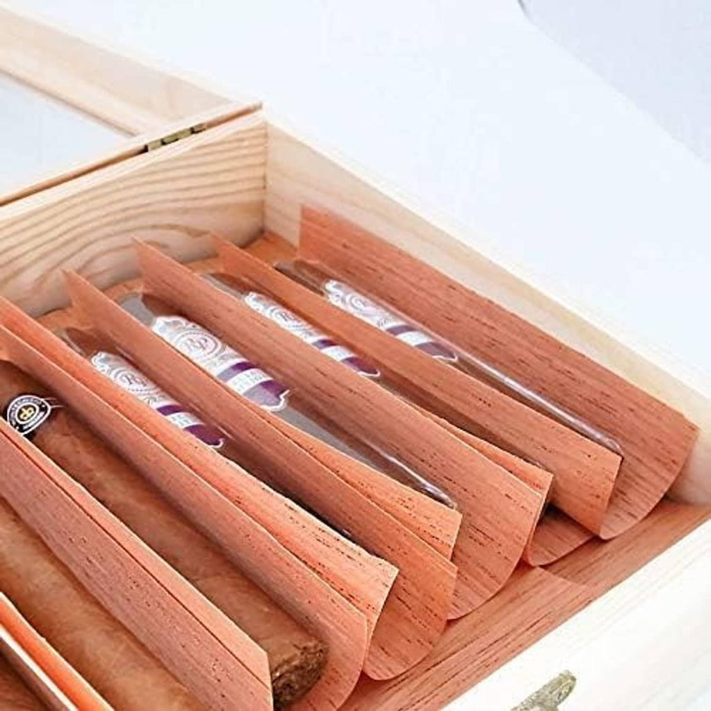 Spanish cedar humidor slat inserts with multiple cigar slots in an open box