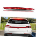 Red LED third brake light replacement with clear housing, shown above a car rear view