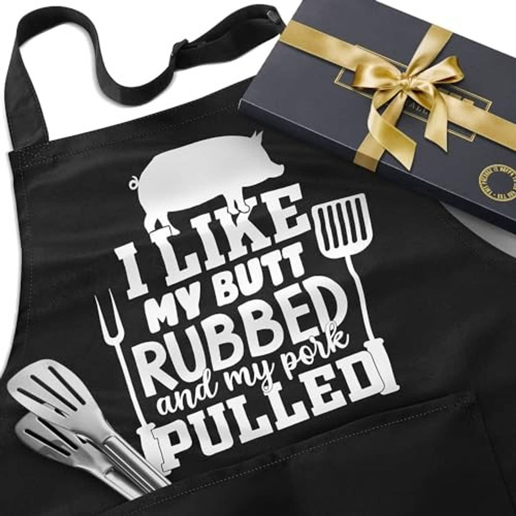 Black apron with white chef-style graphic print, two front utensil icons, pocket
