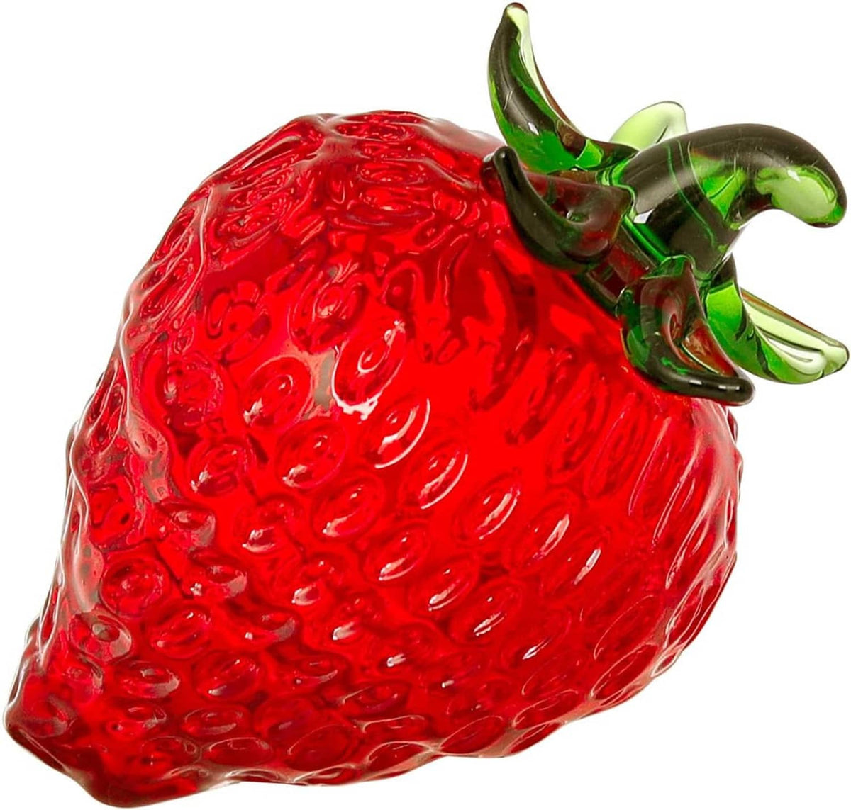Close-up red glass strawberry paperweight figurine with green leaves and clear crystal shine