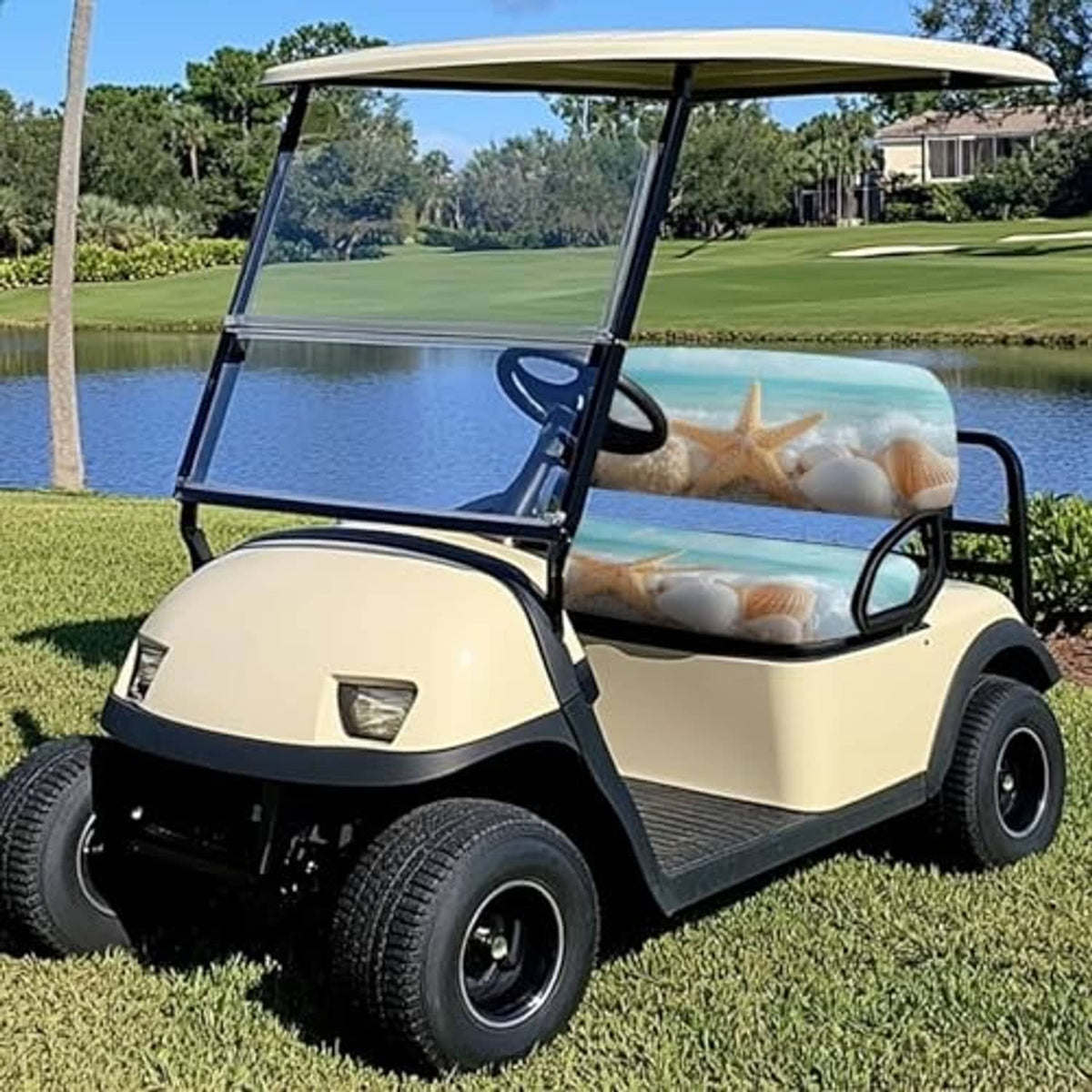 Golf cart bench seat cover in blue with starfish and seashell print, snug cushion fit