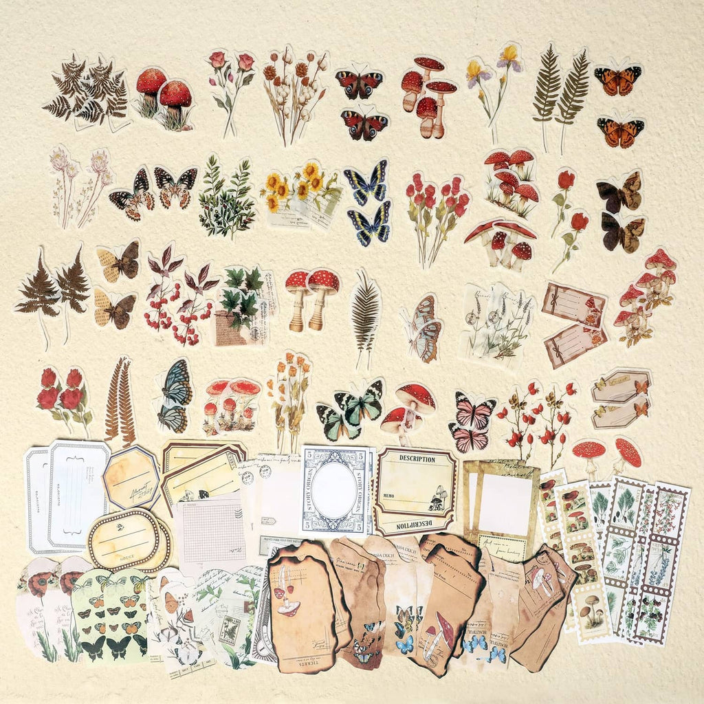 Vintage sticker sheet bundle with butterflies, mushrooms, flowers, and small label cards