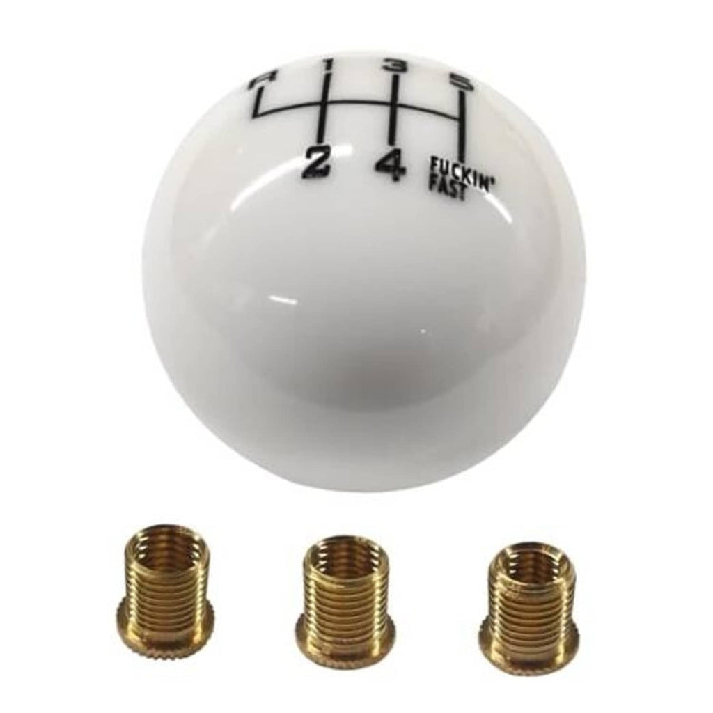 White round 6-speed gear shift knob with black numbered grid markings on top