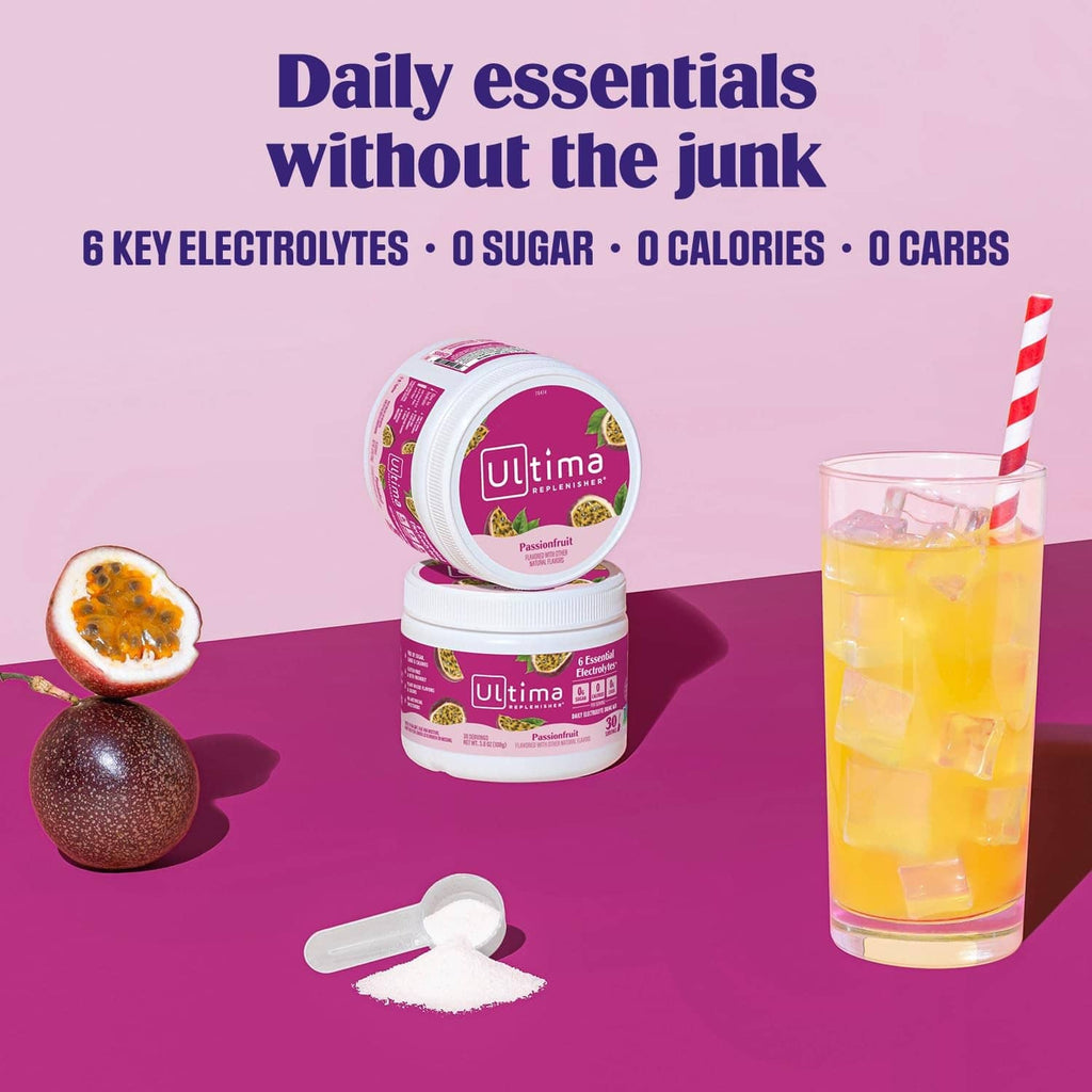 Two Passionfruit electrolyte powder tubs with scoop and clear glass drink