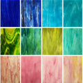Variety stained glass mosaic sheets, multicolor swatch grid of blue and green tones