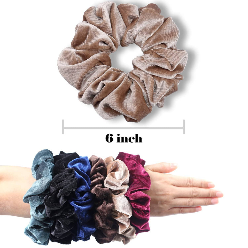 Beige velvet jumbo scrunchie, shown with mixed-color scrunchies on hand