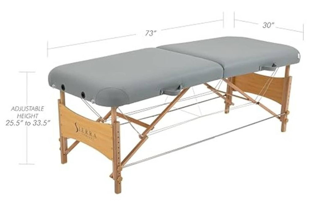 Gray portable massage table with padded top and adjustable height supports
