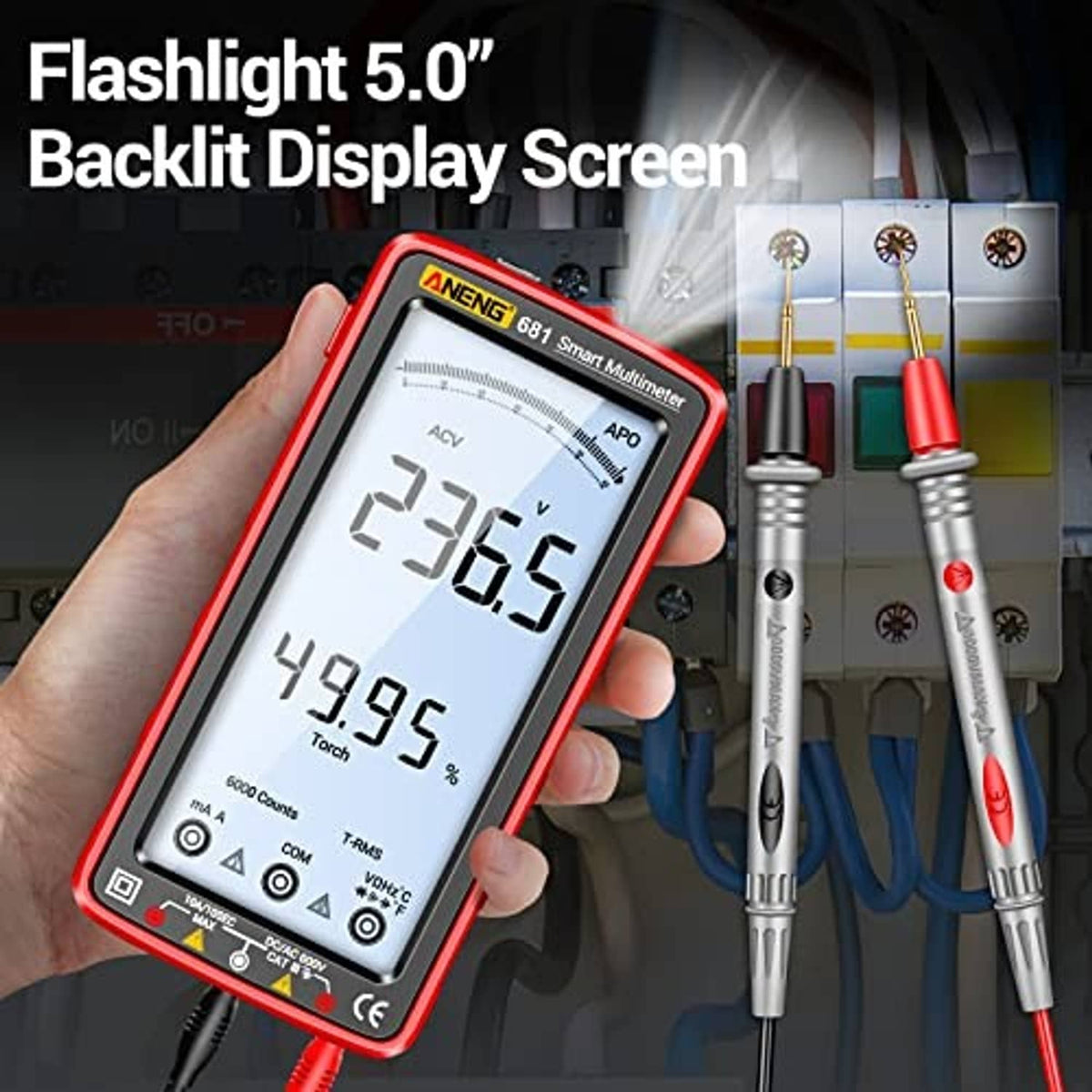 Red digital multimeter tester showing LCD readings and two test probes with connectors