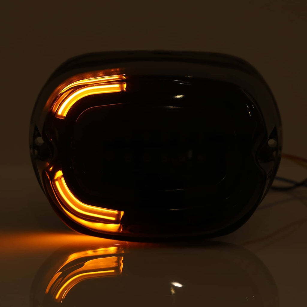 Smoked LED rear tail light with amber turn signal bars, side profile